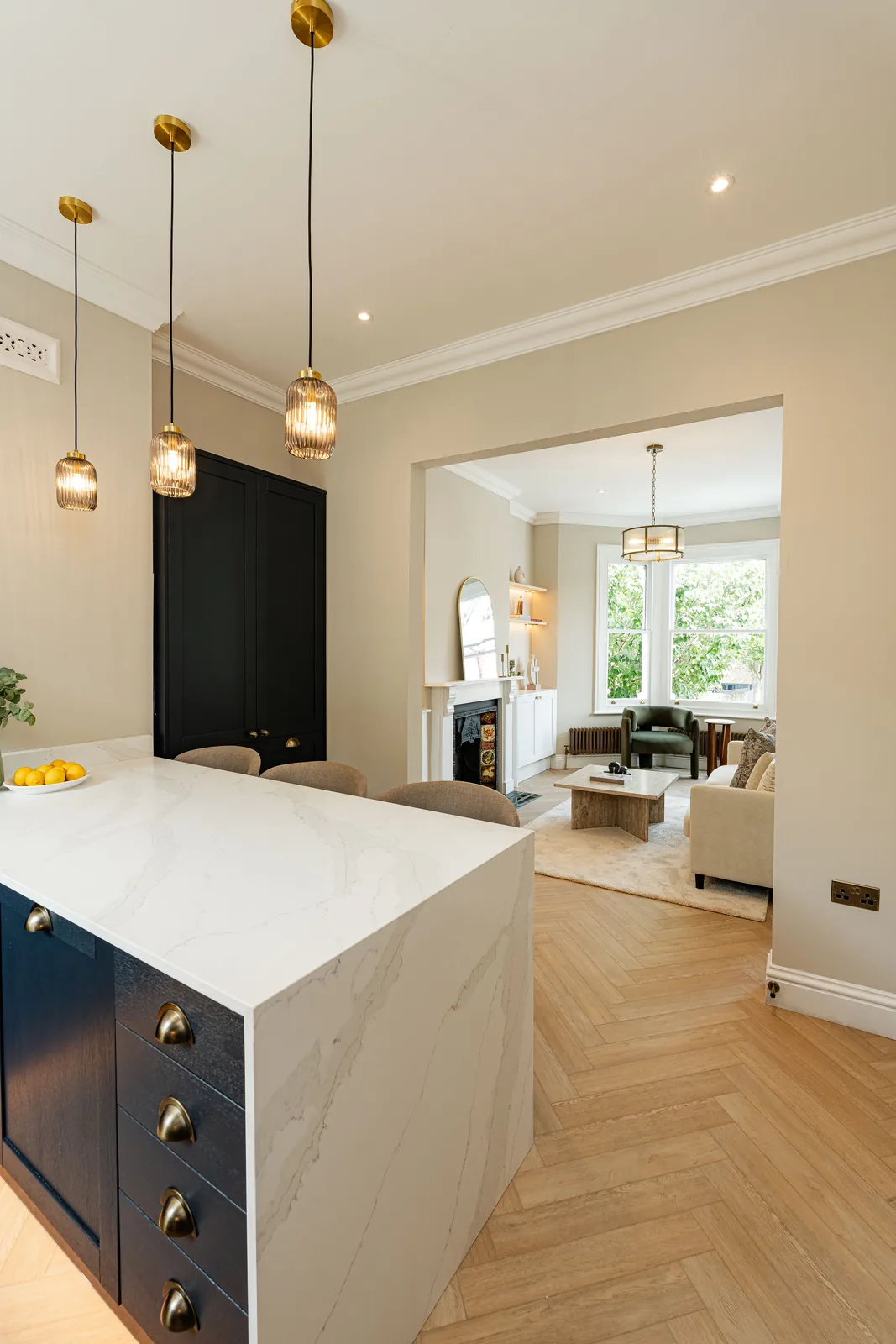 The kitchen peninsula and pendant lighting